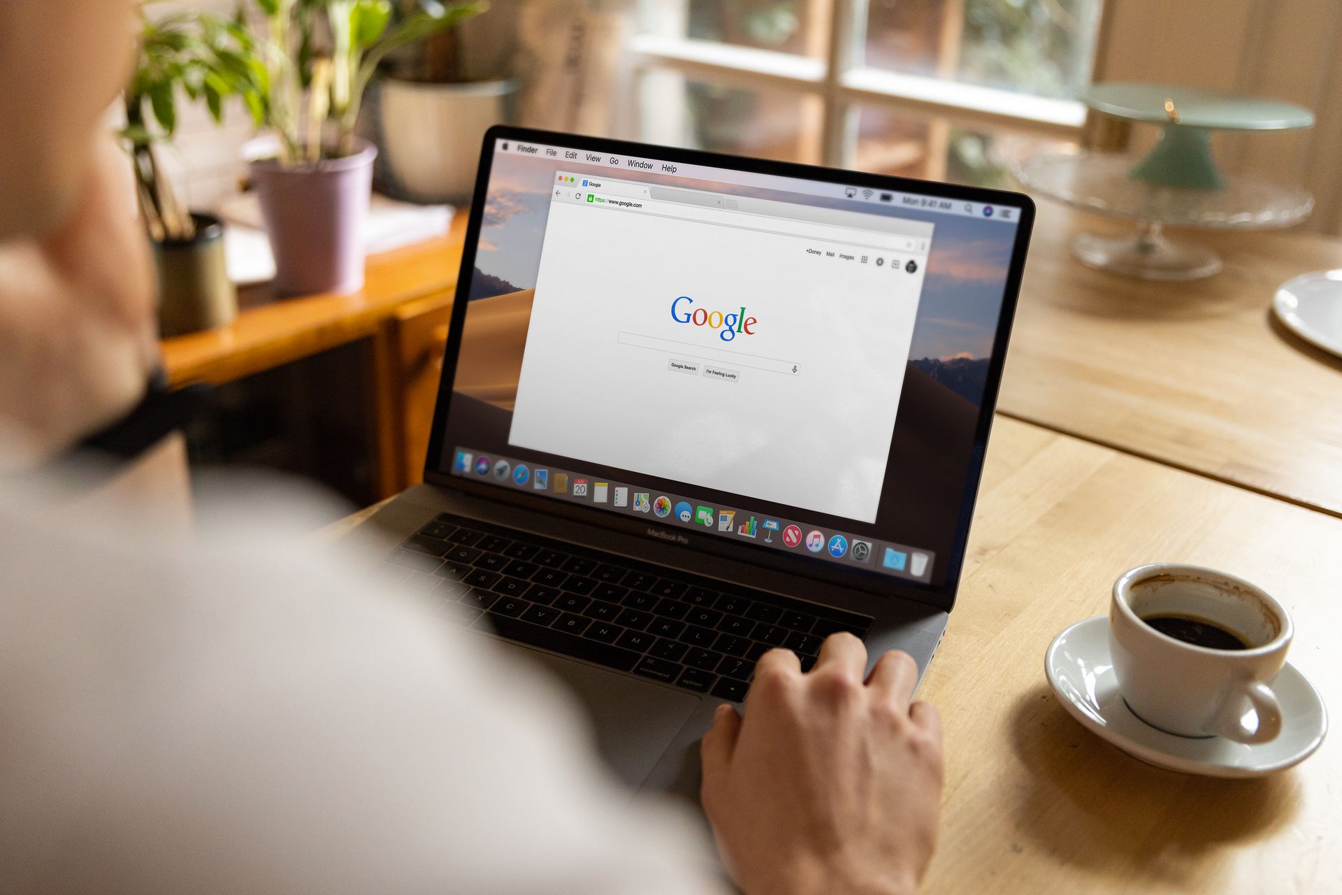 Business owner comparing proposals from search engine marketing companies side by side